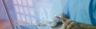 Der Finger einer Person berührt einen Bildschirm, der mit Künstlicher Intelligenz (KI) in Verbindung steht.